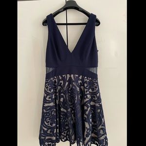 Like NEW navy dress with cut outs! Great for weddings!